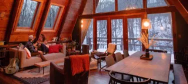Rustic lodge interior with wooden beams and natural materials