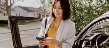 Professional woman discussing real estate details on phone
