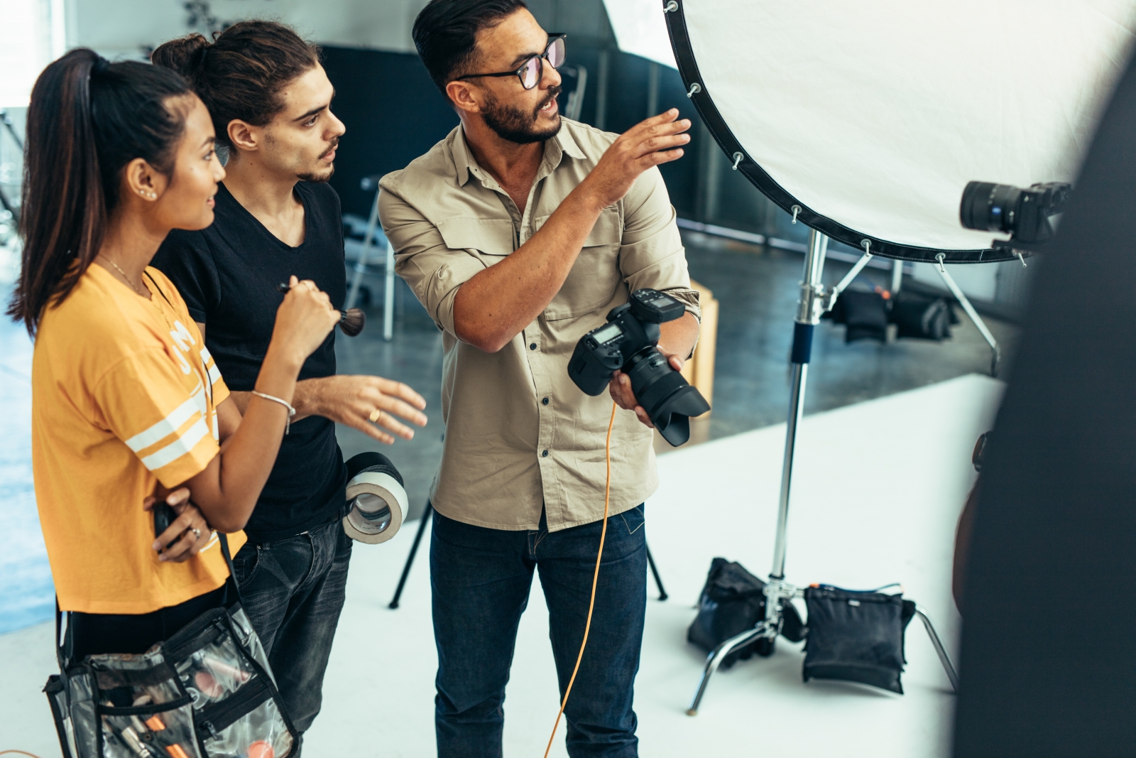 Photographer and stylists at a multifamily property photo shoot.