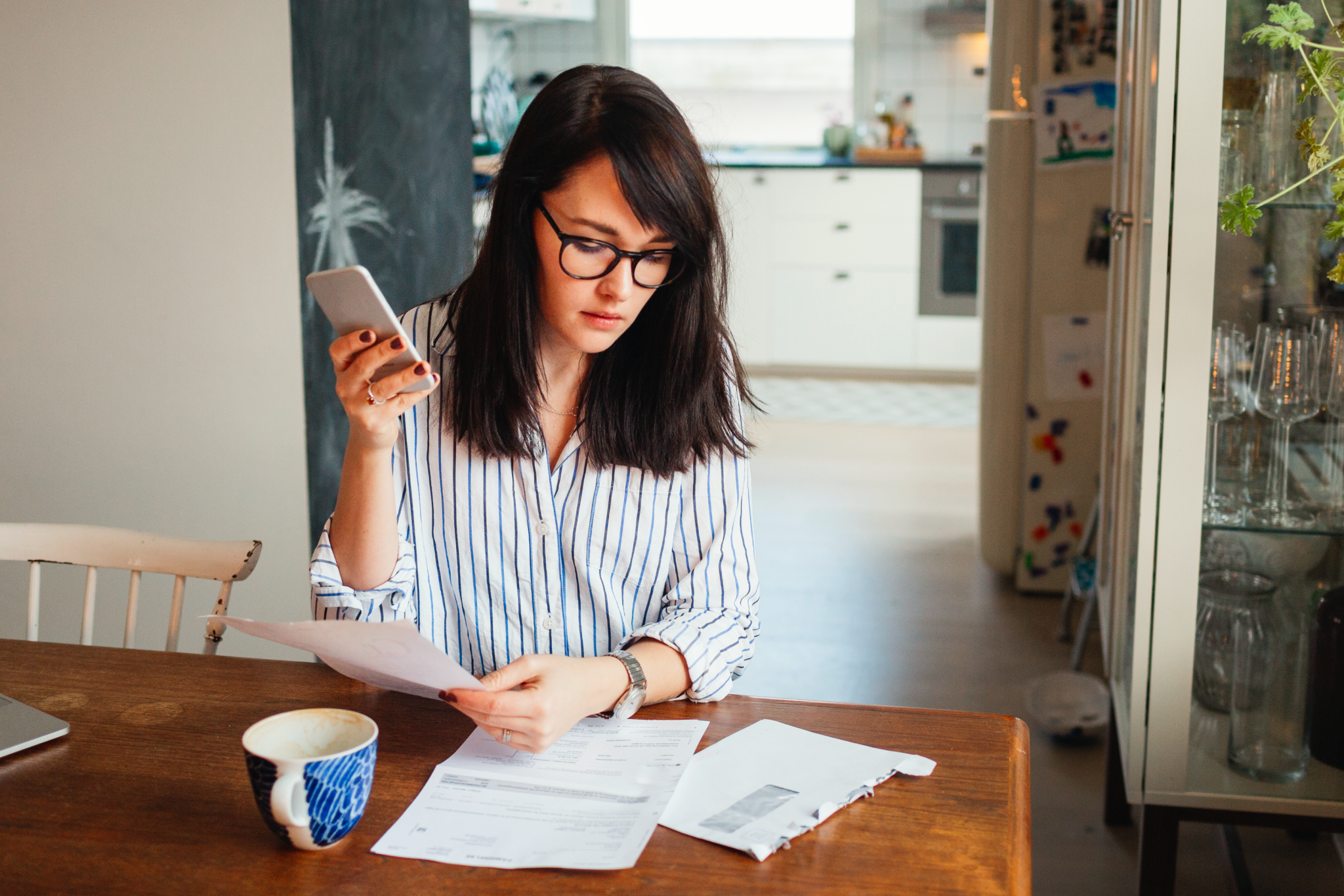 A landlord calculating late fees for rent.