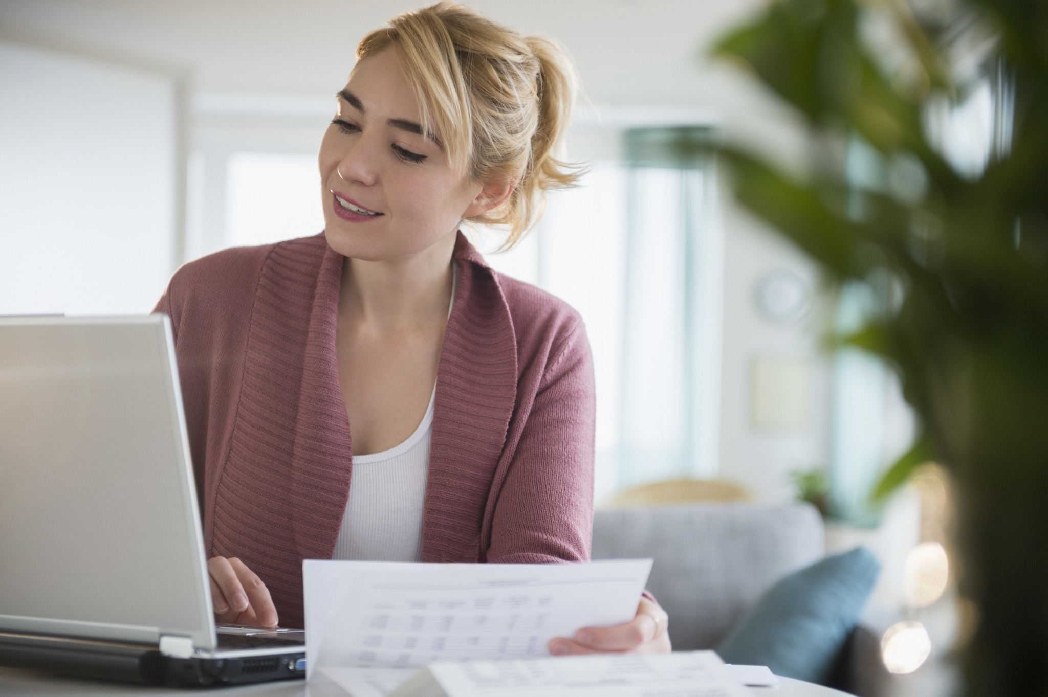 A landlord researching landlord insurance policies online.