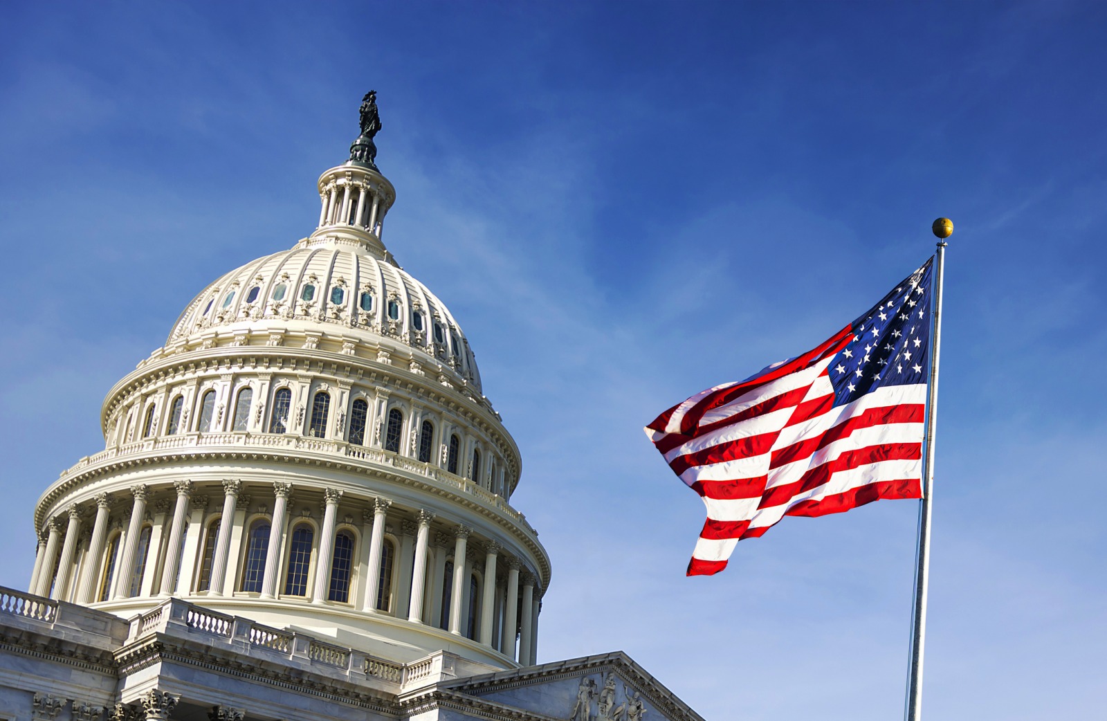 Capitol building and U.S. flag