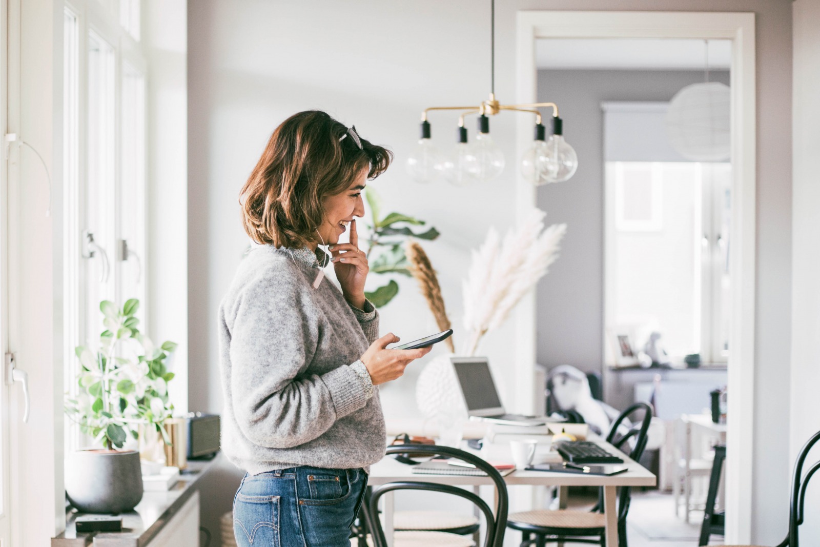 Agent on the phone in her living room