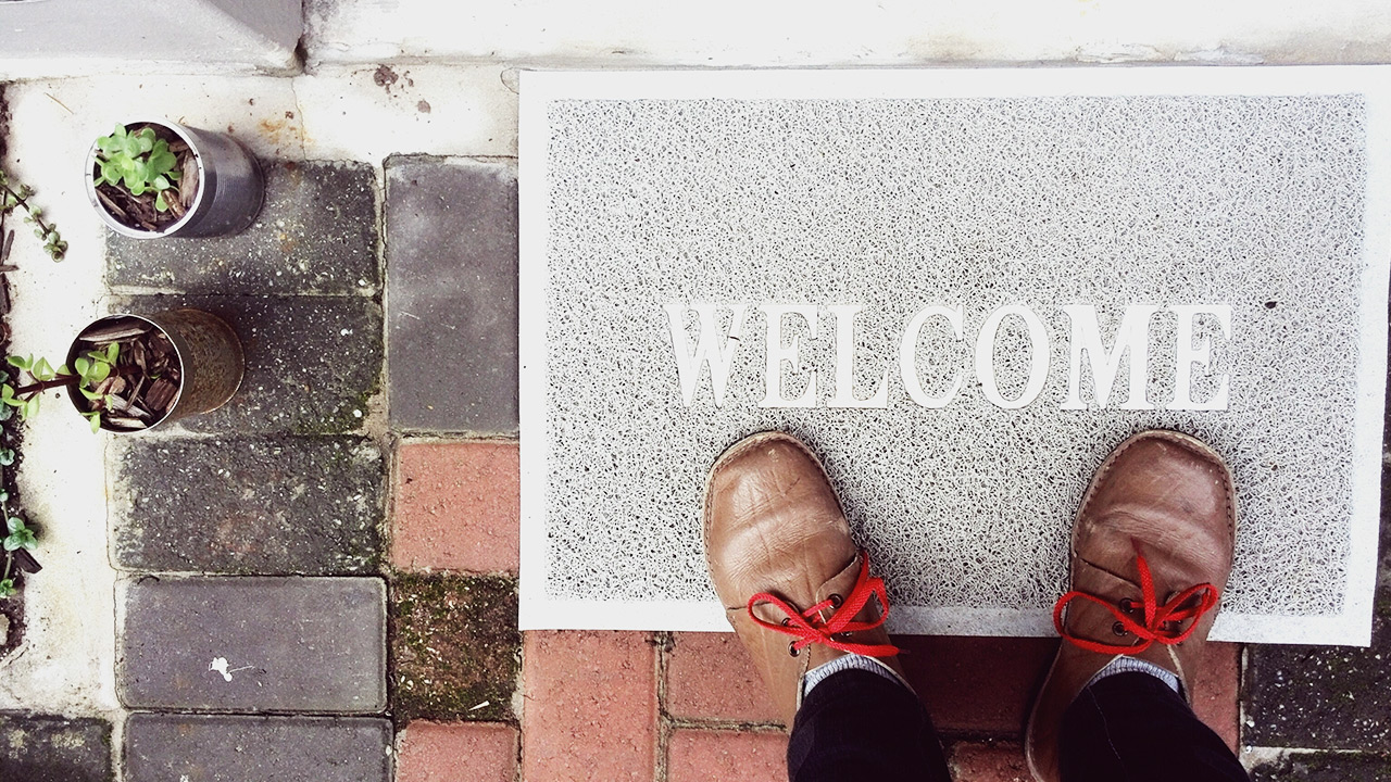 Shoes on a welcome mat