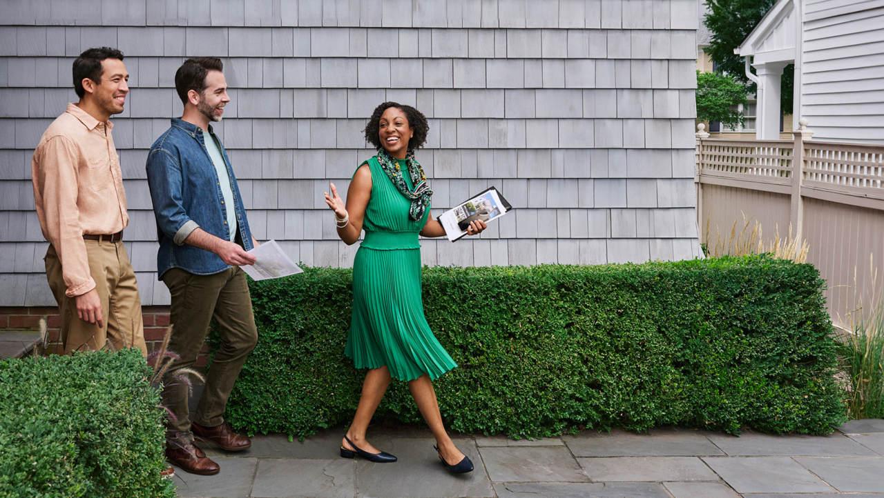 agent leading buyers on a tour