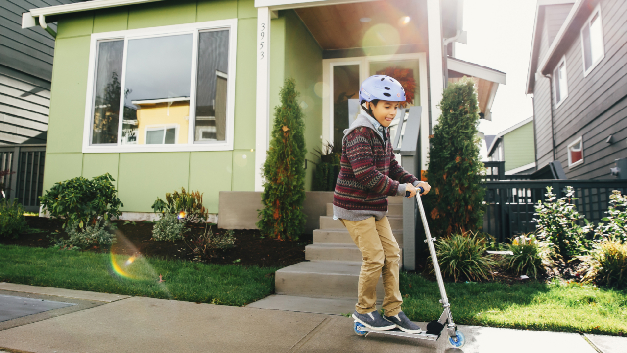 kid on scooter