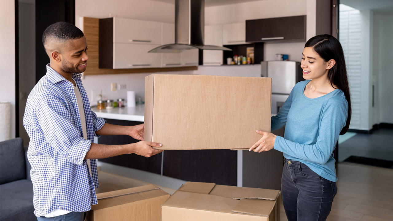 Couple with moving boxes