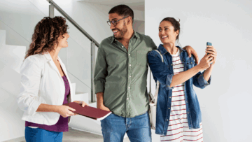 people looking at a home on chatgpt with their real estate agent