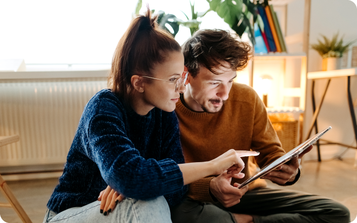 people looking at tablet