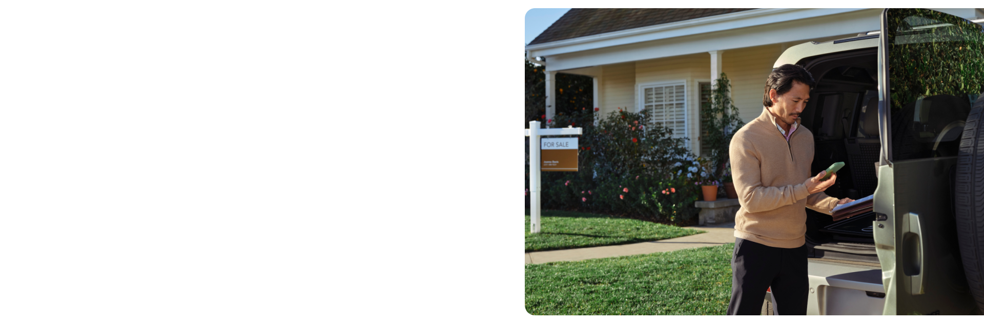 Man outside of house for sale