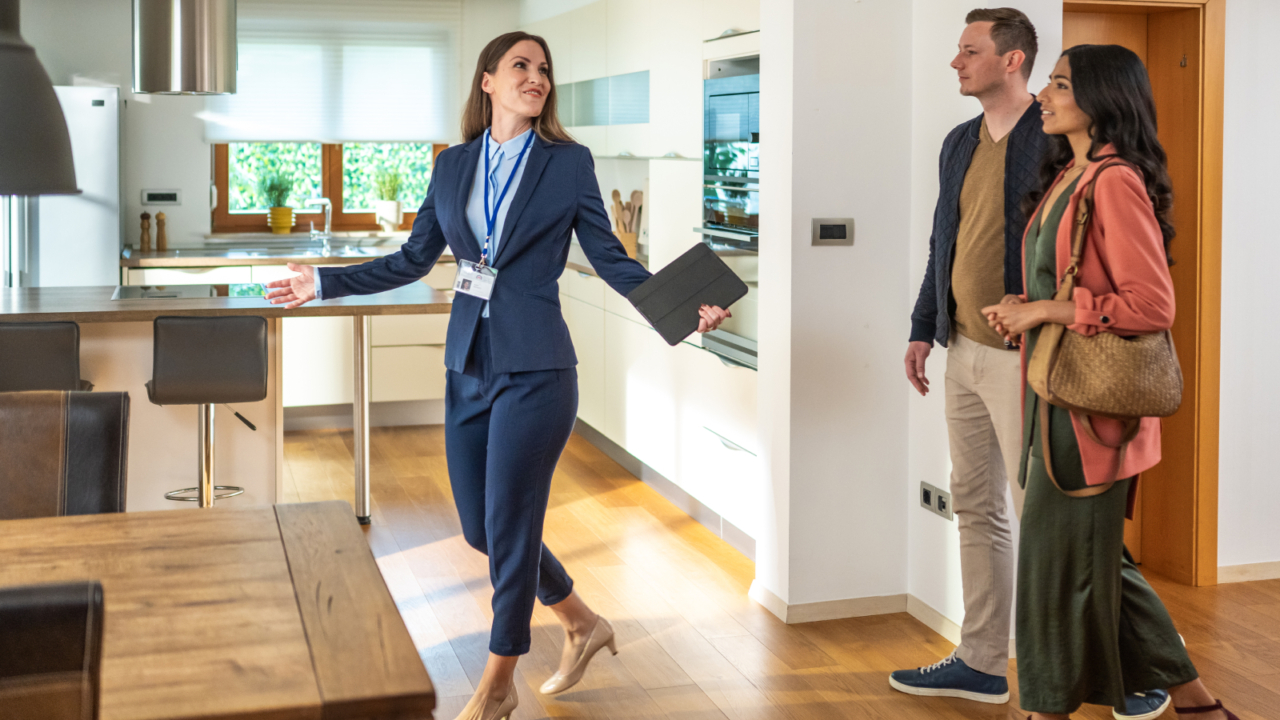 buyers touring house for sale